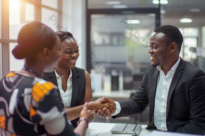 Business partners shaking hands after a successful meeting
